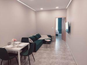Zona de estar de Emerald home