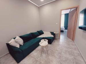 Zona de estar de Emerald home