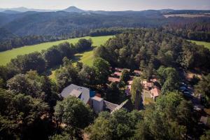 an aerial view of a house in the trees at ZirkelsteinResort gGmbH in Schöna
