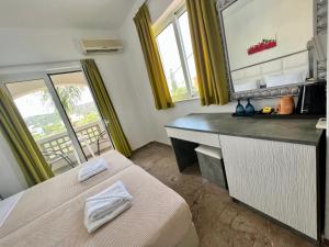 Kuchyň nebo kuchyňský kout v ubytování Maria Hotel Sisi