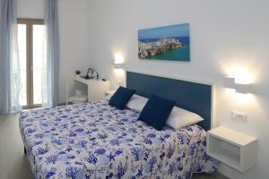 Postel nebo postele na pokoji v ubytování B&B AlMare + 9 fotografií