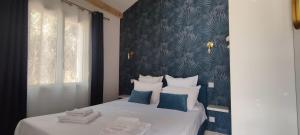 Postel nebo postele na pokoji v ubytování Reves de pampa - CASA AZUR + 11 fotografií