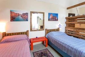 A bed or beds in a room at Casa vacanza Enea con idromassaggio - Apulia Home