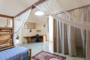 A bed or beds in a room at Casa vacanza Enea con idromassaggio - Apulia Home