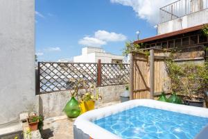 The swimming pool at or close to Casa vacanza Enea con idromassaggio - Apulia Home