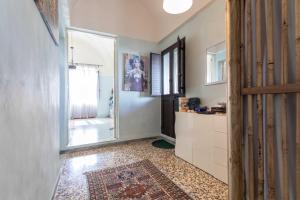 A kitchen or kitchenette at Casa vacanza Enea con idromassaggio - Apulia Home