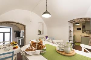 Kuchyň nebo kuchyňský kout v ubytování B&B I Tre Camini