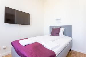 Letto o letti in una camera di ApartDirect Linköping Vasastaden