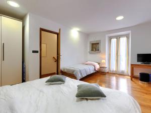 Posteľ alebo postele v izbe v ubytovaní Holiday Home Erika by Interhome