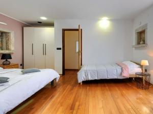 Posteľ alebo postele v izbe v ubytovaní Holiday Home Erika by Interhome