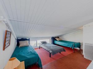 מיטה או מיטות בחדר ב-Holiday Home Les Brigantins-3 by Interhome
