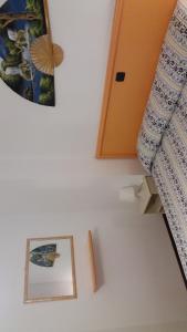 Postel nebo postele na pokoji v ubytování Appartamenti Falco