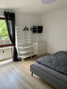 Postel nebo postele na pokoji v ubytování Moselflair