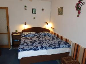 מיטה או מיטות בחדר ב-Holiday Home Plavsko by Interhome