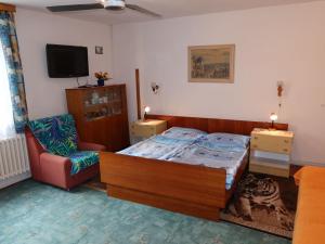 Televízia a/alebo spoločenská miestnosť v ubytovaní Holiday Home Plavsko by Interhome