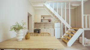 A kitchen or kitchenette at Fata Morgana Studios & Apartments