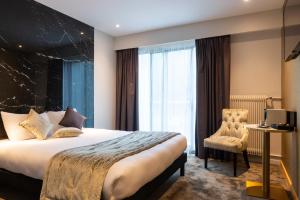 Posteľ alebo postele v izbe v ubytovaní Hôtel d'Angleterre Rouen Centre Gare