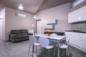 Kuchyň nebo kuchyňský kout v ubytování Eracle Hotel