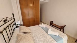 Posteľ alebo postele v izbe v ubytovaní V60 Apartamento 3 habitciones con vistas al mar