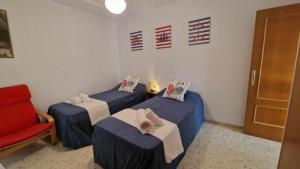 Posteľ alebo postele v izbe v ubytovaní V60 Apartamento 3 habitciones con vistas al mar