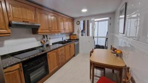 Kuchyňa alebo kuchynka v ubytovaní V60 Apartamento 3 habitciones con vistas al mar