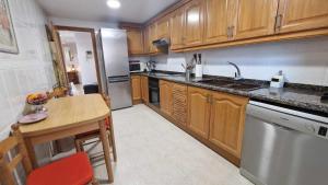 Kuchyňa alebo kuchynka v ubytovaní V60 Apartamento 3 habitciones con vistas al mar