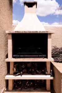 a building with a light on top of a wall at Apartamentos Ohana in Jadraque