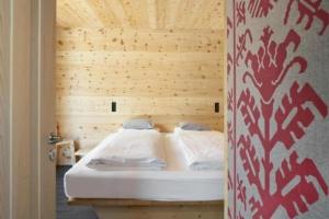 Легло или легла в стая в Alpine Lodge 2-Bett-Wohnung Chesa a la Punt "Bergbahnen All inklusive" im Sommer