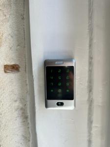 an electronic device is attached to a wall at Madonna suites in Split