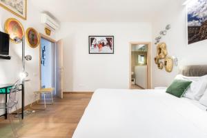 Posteľ alebo postele v izbe v ubytovaní Matteotti Apartment