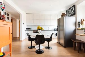 Kuchyňa alebo kuchynka v ubytovaní Matteotti Apartment