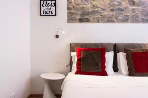 Posteľ alebo postele v izbe v ubytovaní Matteotti Apartment