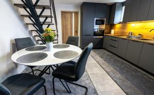 Kuchyň nebo kuchyňský kout v ubytování REKREAČNÝ DOM