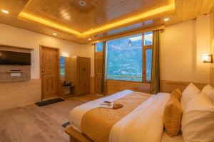 TV o dispositivi per l'intrattenimento presso The Social Stays Manali formerly ArtBuzz