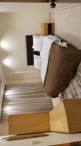 a bedroom with a large bed in a room at Marmaris Hotel Apartments in Amman