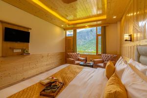 TV o dispositivi per l'intrattenimento presso The Social Stays Manali formerly ArtBuzz