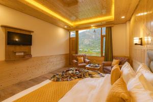 TV o dispositivi per l'intrattenimento presso The Social Stays Manali formerly ArtBuzz