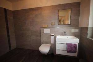 Ένα μπάνιο στο Ferienhaus Zur schönen Heidewabe