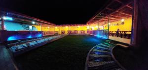 a bowling alley at night with blue lights at Chill House make a Good Story with infinite Ocean Surf and Stay in Weligama