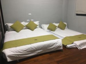 Postel nebo postele na pokoji v ubytování 知本赫克力士親子民宿Chihpen Hercules Family Homestay