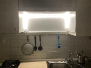 Kuchyň nebo kuchyňský kout v ubytování Poppy Flower Apartment