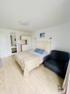 A bed or beds in a room at Pokoje Gościnne i Apartamenty Ula