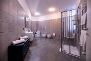 Koupelna v ubytování Eracle Hotel