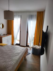 Rúm í herbergi á Divčibare_sunrise