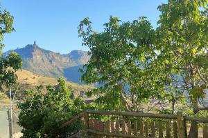 a view of the grand canyon from a wooden fence at La Cabañita in Las Palmas de Gran Canaria +2 photos