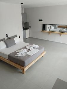 Postel nebo postele na pokoji v ubytování Zorbas