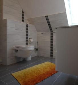 Koupelna v ubytování Appartement in Pellworm mit Grill, Terrasse und Garten