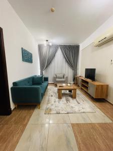 Posezení v ubytování Husin Al Khaleej Hotel Apartment + 37 fotografií