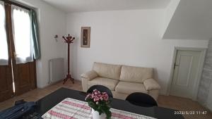 Posezení v ubytování Appartamento Taverna Gattolini Venzone