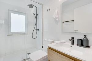 Koupelna v ubytování Cruzeiro Deluxe Apartments + 28 fotografií
